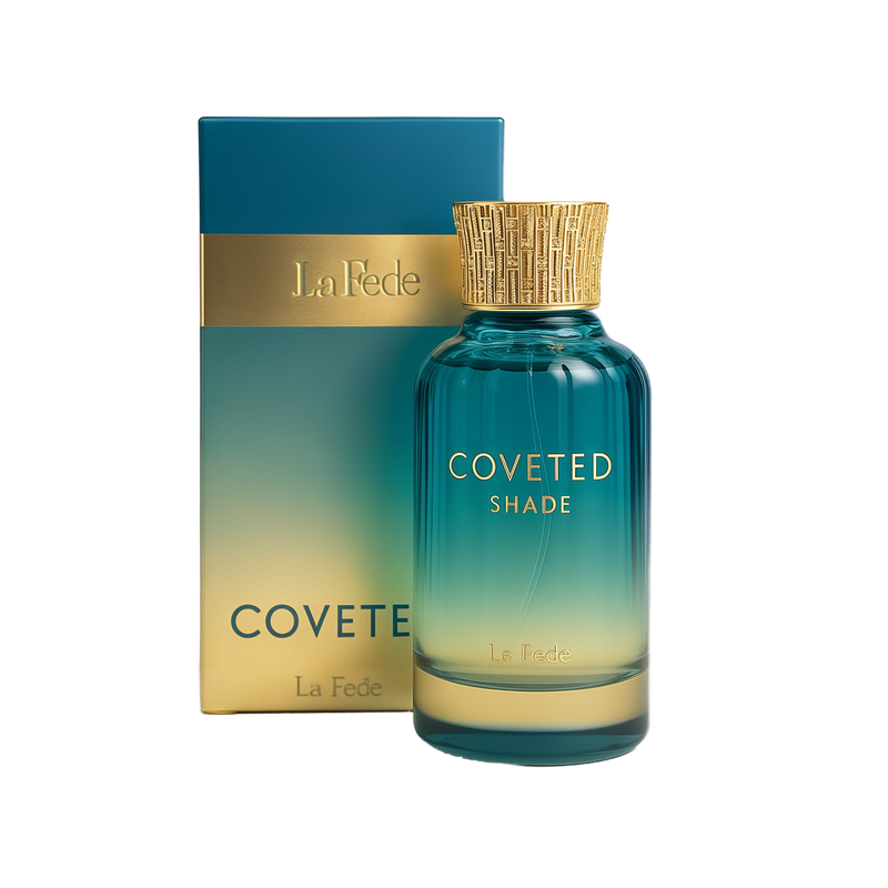 A bottle and packaging of Coveted Shade Eau De Parfum by La Fede. The perfume bottle features a gradient design transitioning from teal blue at the top to a golden hue at the bottom, with gold embossed text reading "COVETED SHADE" and "La Fede." It has a textured, cylindrical gold cap with an intricate pattern. The box beside it mirrors the bottle's color scheme, with a gold band across the top section bearing the "La Fede" logo.
