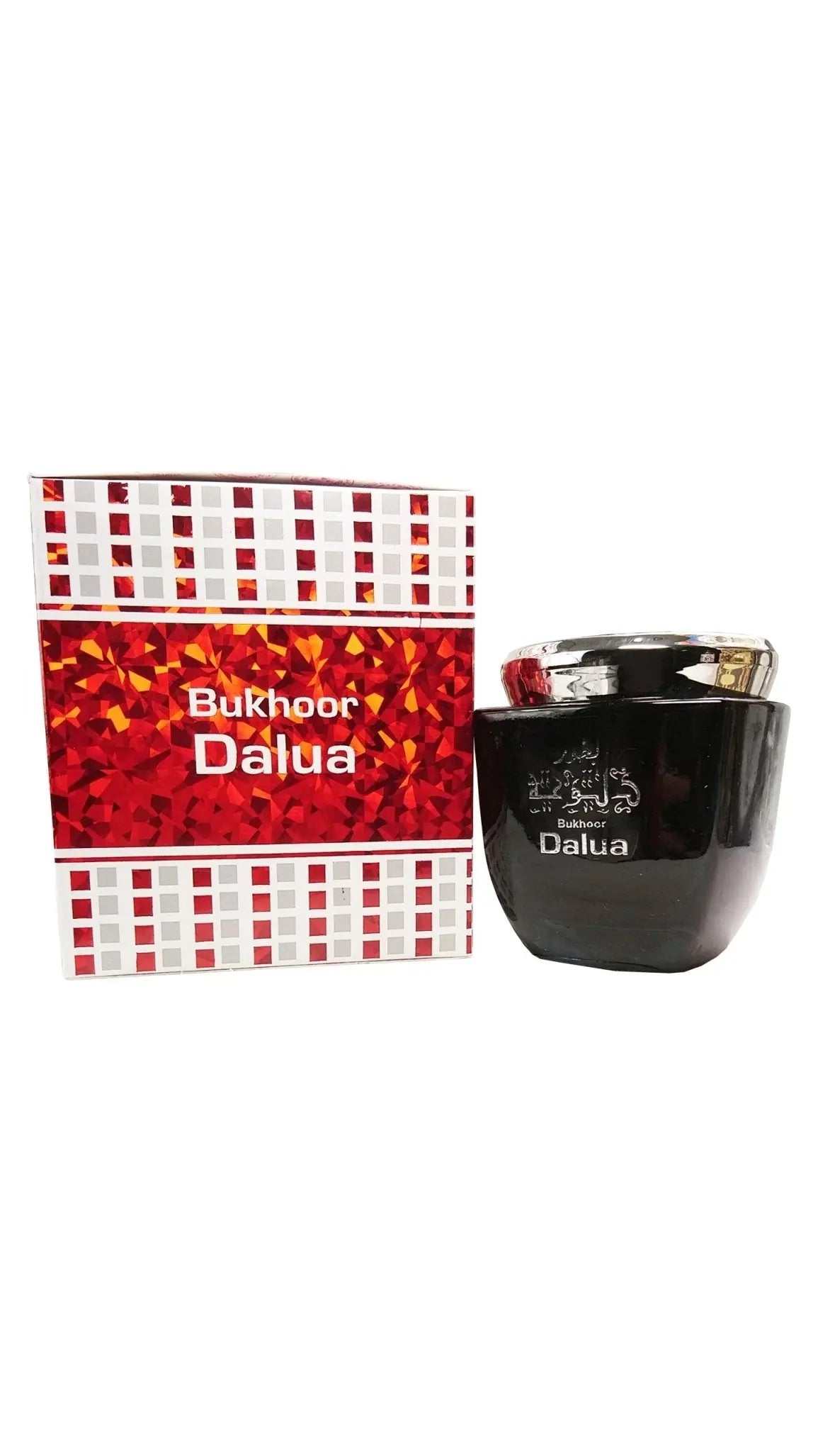 A black jar with a silver lid, labeled "Bukhoor Dalua" in white Arabic and English script, presented next to a packaging box with a mosaic of red and white checkered pattern and a central band featuring the same "Bukhoor Dalua" branding. This product is typically used in Middle Eastern cultures as incense to scent rooms and clothing, and the presentation suggests a modern take on traditional bakhoor.