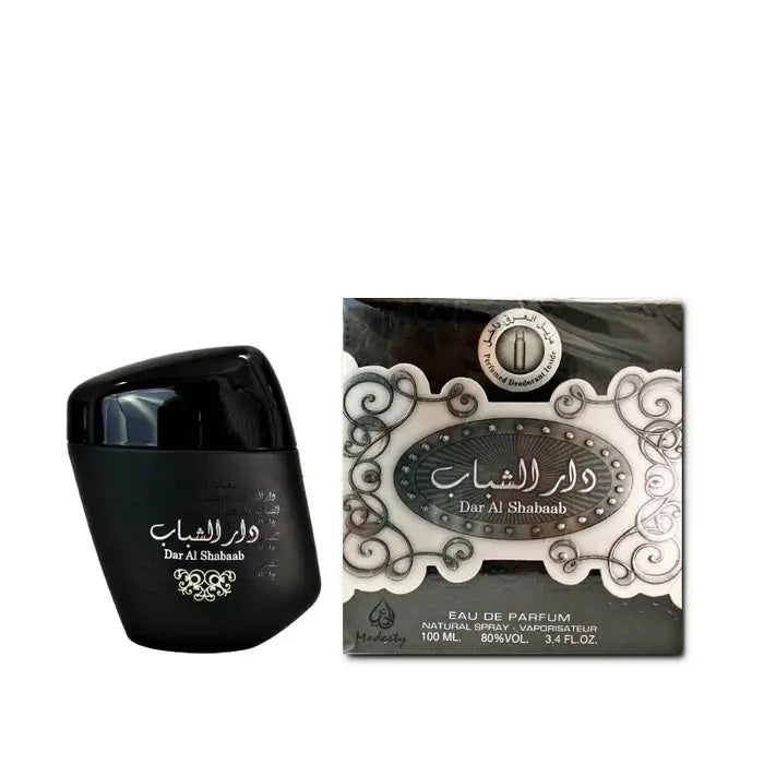 The image shows a product, which appears to be a bottle of perfume next to its packaging. The bottle is black with a curved design and has Arabic script on it along with the text "Dar Al Shaabab". The packaging has a gray and white design with similar Arabic script and English text "Dar Al Shaabab" and additional details, including "Eau de Parfum", "Natural Spray", "100 ML", and the concentration of perfume (80% vol). The packaging also features a circular logo at the top with Arabic calligraphy.