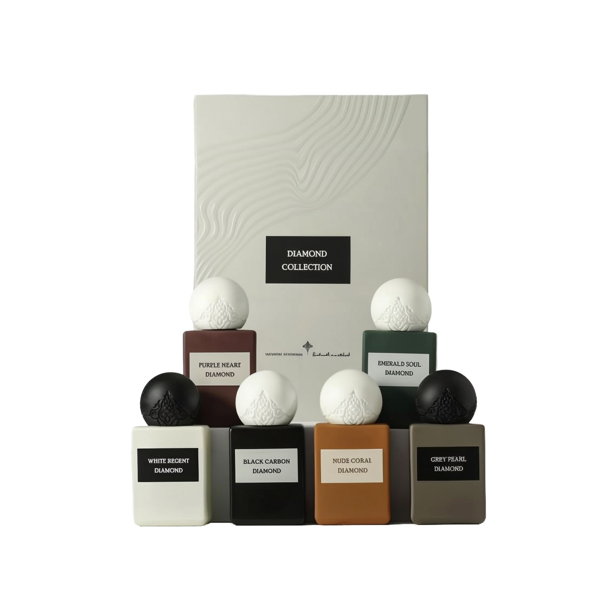 A boxed set of the Diamond Collection Mini perfumes by Ibraheem Al-Qurashi, featuring seven compact bottles arranged in two rows. Each bottle has a quilted texture and is uniquely colored with either white or black spherical caps. The visible fragrances include: Purple Heart Diamond (maroon), Emerald Soul Diamond (emerald green), White Regent Diamond (white), Black Carbon Diamond (black), Nude Coral Diamond (coral orange), and Grey Pearl Diamond (grey). 