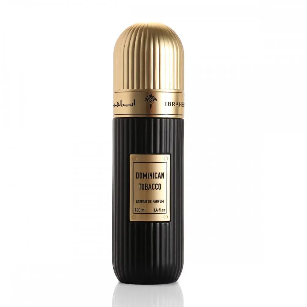 A black perfume bottle with vertical ridges and a gold cap. The bottle has a gold label with "DOMINICAN TOBACCO" in bold letters and "Extrait de Parfum 100 ml 3.4 fl.oz" below in smaller font. Above the label, there is Arabic calligraphy and the brand name "IBRAHEEM AL QURASHI" in English. The bottle is placed against a white background, highlighting its design and contents.