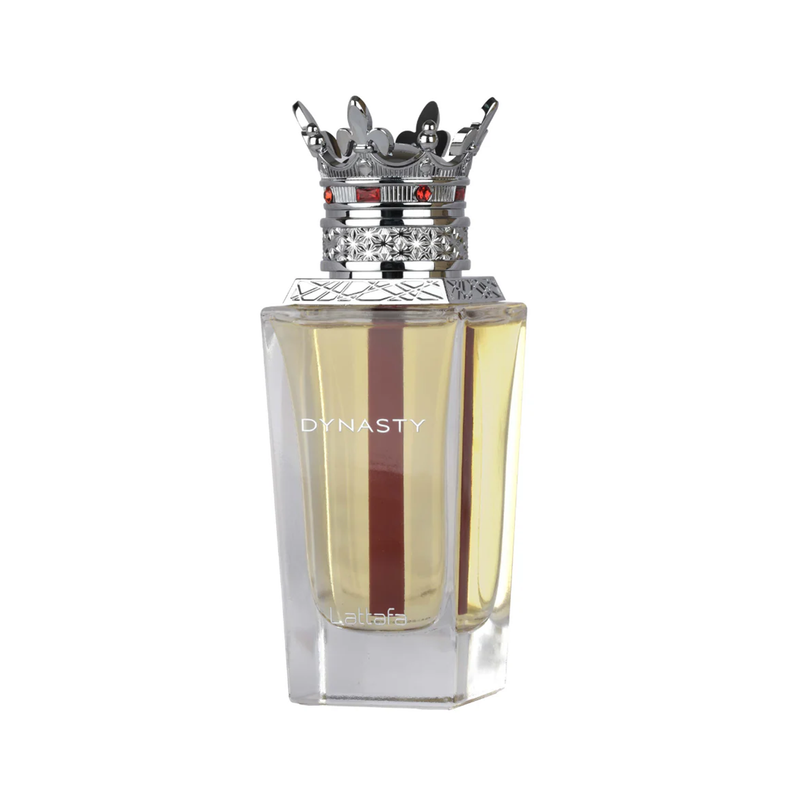 Lattafa Dynasty perfume in a clear bottle with golden liquid and a silver crown-shaped cap.