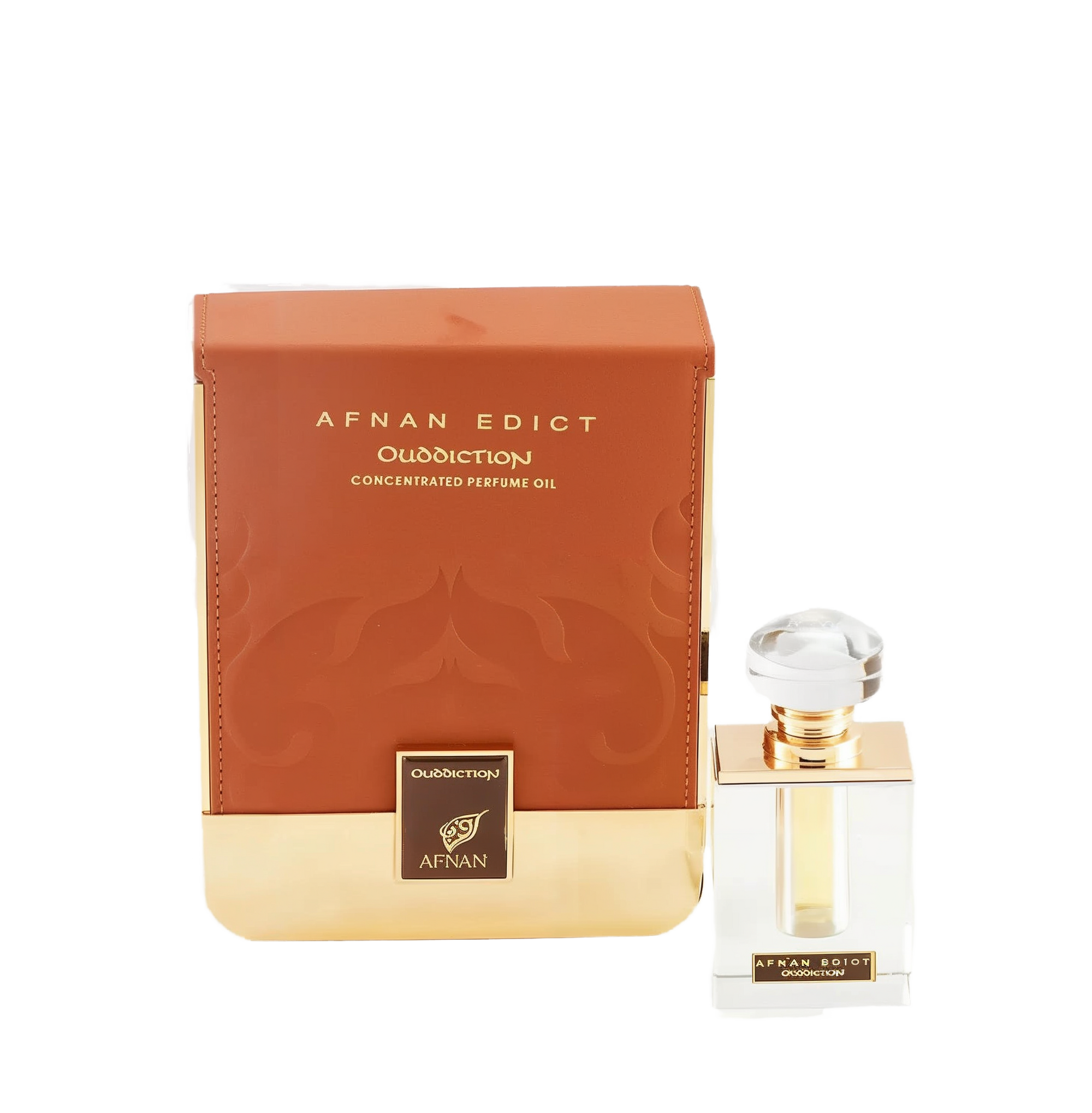 The image shows a perfume product consisting of a rectangular glass bottle and its packaging. The bottle, placed to the right, has a clear liquid with a golden neck and a large, transparent, faceted cap. On its front, there's a label with "AFNAN EDICT Ouddiction" in black letters on a gold background. To the left is the box, in a gradient of brown to gold with a subtle paisley design, and it reads "AFNAN EDICT Ouddiction CONCENTRATED PERFUME OIL" in gold embossed letters. 