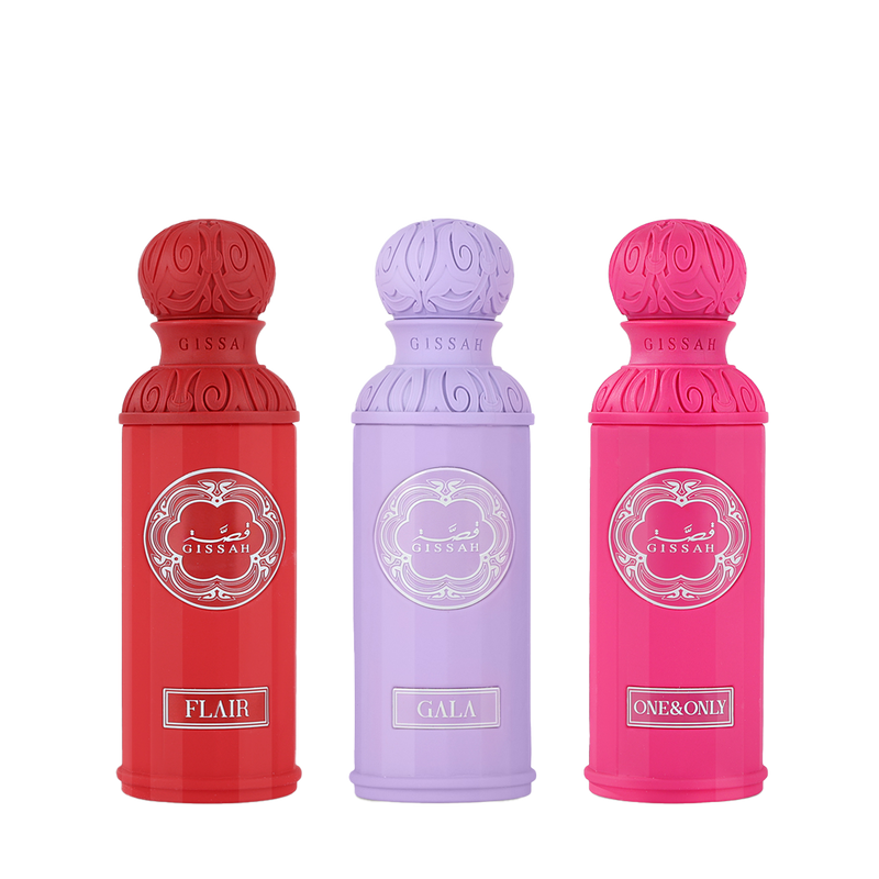Three Gissah perfume bottles in red, purple, and pink