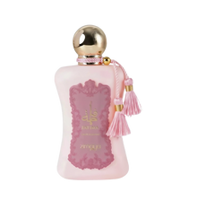 The image shows a bottle of "Fatima" extrait de parfum by Zimaya. The perfume bottle is an elegant, soft pink color with a gold spherical cap. It features a pink label with ornate detailing and gold text, reading "Fatima" in both English and Arabic, along with "extrait de parfum" and the brand name "zimaya" at the bottom. The bottle is adorned with two pink tassels hanging from the neck, adding a touch of luxury and sophistication.