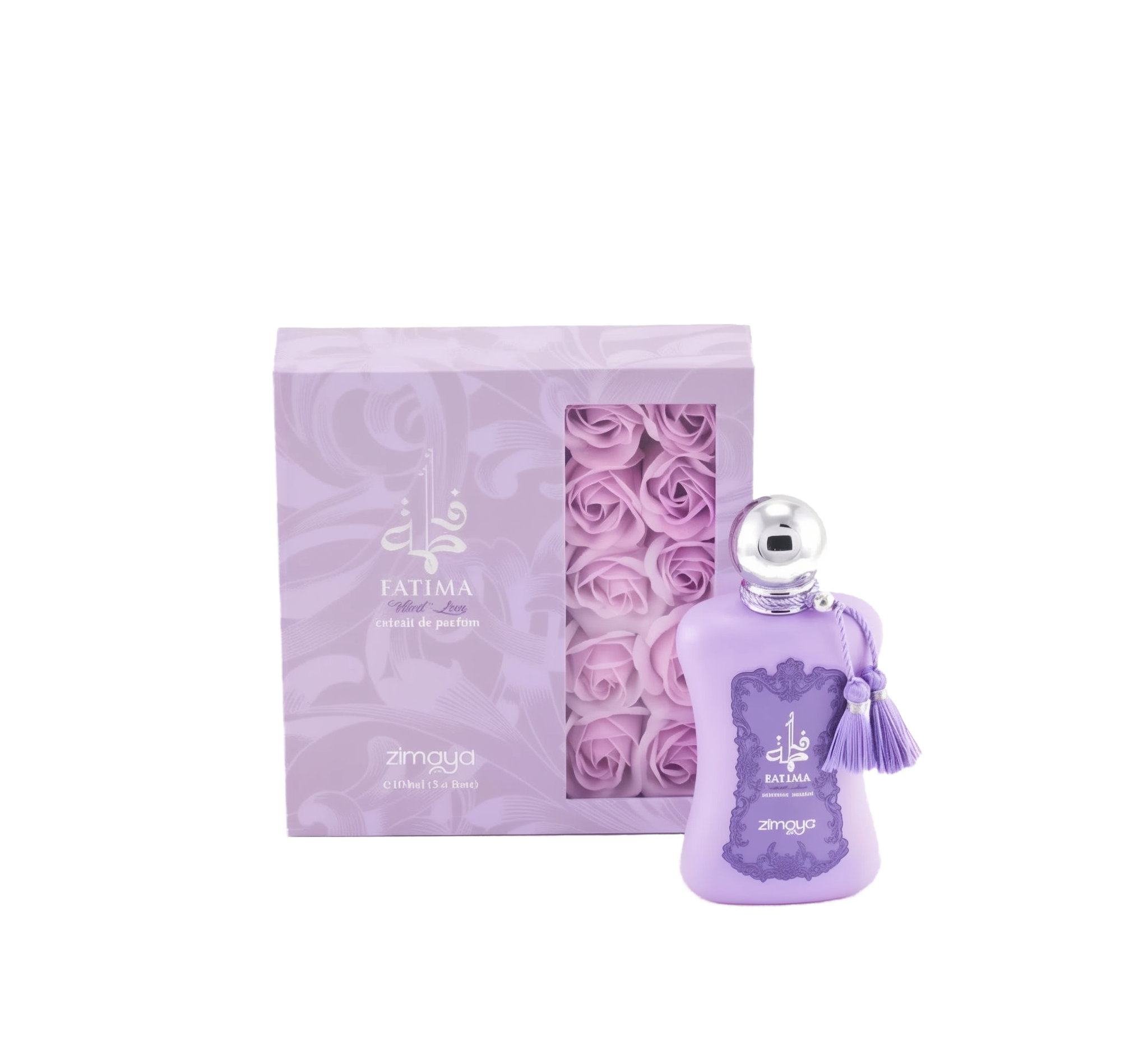 The image shows a bottle of "Fatima Velvet Love" extrait de parfum by Zimaya alongside its packaging. The perfume bottle is a soft lavender color with a silver spherical cap and is adorned with matching lavender tassels.   The accompanying box is also lavender with silver text and a clear window showcasing lavender rose petals inside, enhancing the luxurious and feminine presentation of the product.