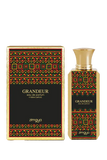 The image showcases "GRANDEUR" eau de parfum by Zimaya, along with its decorative box. The perfume bottle is rectangular with a bold geometric pattern in red, green, and gold, echoing traditional designs. A simple gold cap tops the bottle. The matching box mirrors the bottle's design with a black background, creating a striking contrast.