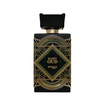 The image shows a perfume bottle for "Happy Oud" by Zimaya. The bottle has a sleek, flat rectangular shape with a black color scheme. It features a ribbed black cap and a gold neck, adding a touch of elegance. The central label is ornate, with a geometric, Art Deco-inspired design in gold lines against a black background, framing a central teal diamond shape. Within this diamond, the words "Happy Oud" are written in a stylized white font, with the brand name "zimaya" below in a smaller font.