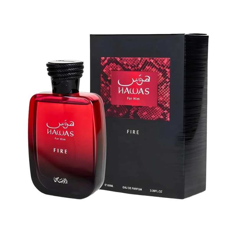 A rectangular glass fragrance bottle in a red gradient color with a black cap, labeled “Hawas Fire for Him” in Arabic and English, next to a matching black box featuring a red textured design and the same branding.