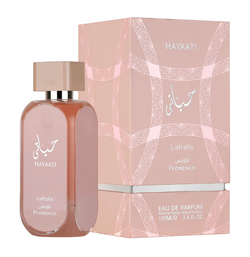 Hayaati Florence Eau de Parfum by Lattafa. The perfume bottle is rectangular with rounded edges, featuring a soft beige-pink hue and a silver cap. The front of the bottle displays the Hayaati branding in Arabic and English, with 'Lattafa' and 'Florence' w
