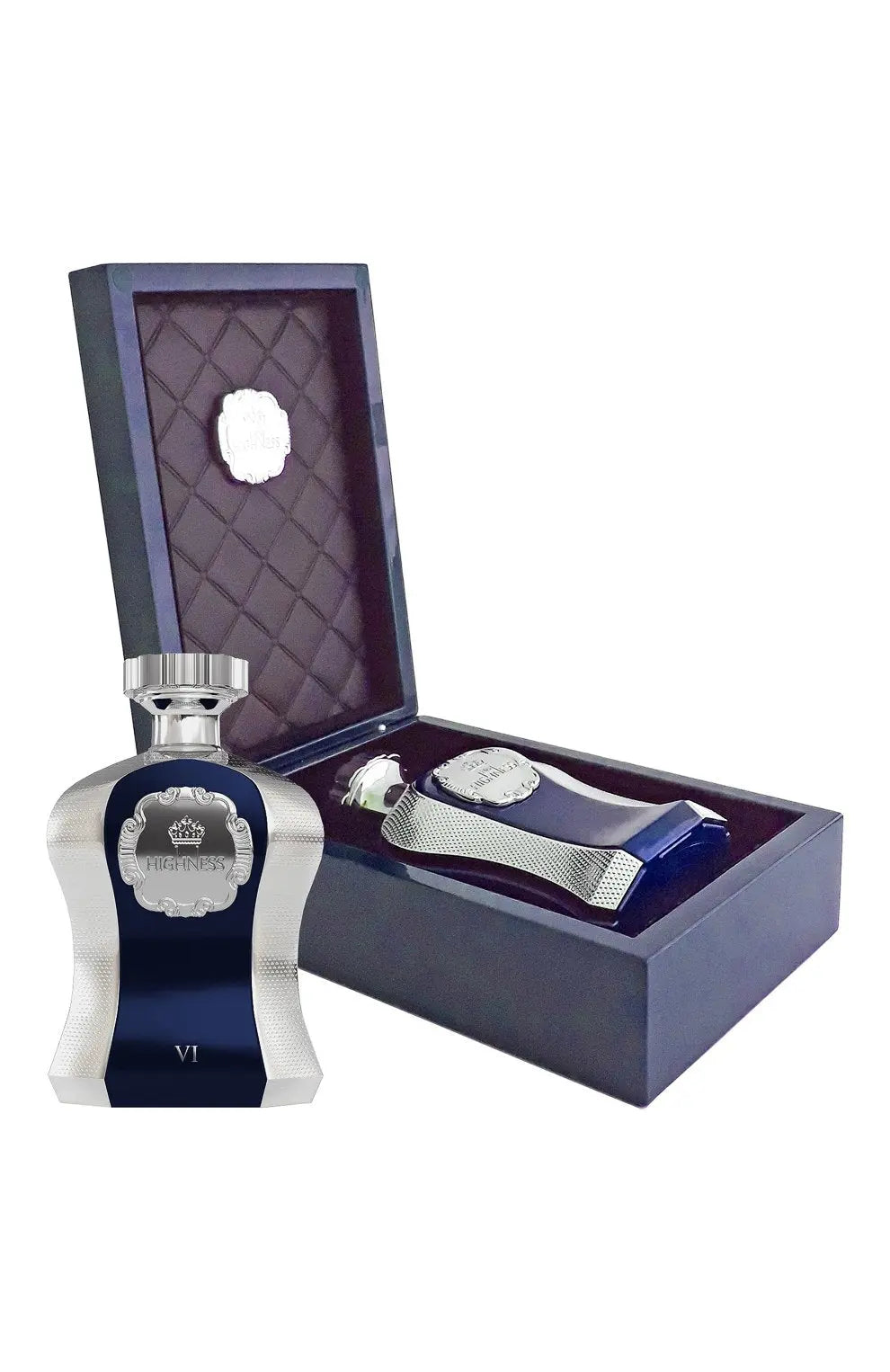 The image showcases an elegant perfume set which includes a luxurious bottle of "Highness VI" fragrance and a matching accessory. The perfume bottle is designed with a deep blue color in the center bordered by textured silver sides, topped with a polished silver cap. It is placed inside an open, dark-colored presentation box with a quilted interior, enhancing the product's opulence. The box and the bottle both feature the "Highness" insignia, signifying a royal and exquisite scent profile.
