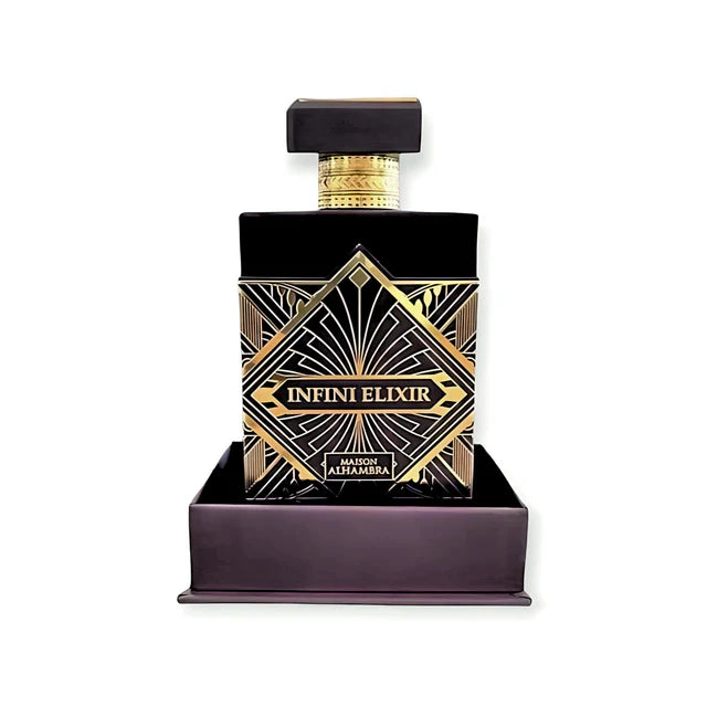 Infini Elixir by Maison Alhambra - a luxurious black perfume bottle with gold geometric patterns, displayed in a matching base. The bottle features a sophisticated rectangular design with a bold label at the center, highlighting the opulent and high-end nature of this fragrance. The set emphasizes elegance and exclusivity.