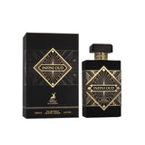 Infini Oud by Maison Alhambra - a sophisticated black perfume bottle with gold geometric patterns and matching packaging. The bottle, alongside its box, features an elegant gold and black design with a prominent label at the center. The set showcases the luxurious and high-end nature of this eau de parfum, containing 100 ml (3.4 fl. oz.) of fragrance.