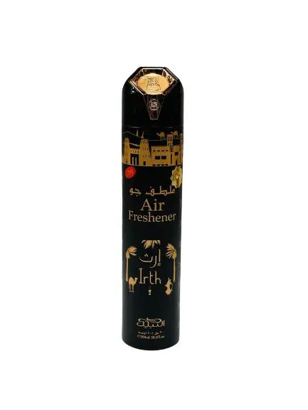 The image shows an air freshener can with the name "Irth." The can has a black background with gold text and decorative elements, including a depiction of a castle or traditional building and palm trees. The text "Air Freshener" is prominently displayed in the center in English, with "Irth" written in both Arabic and English below. The can has a gold-colored cap with a diamond-shaped emblem on top. The design suggests a product with a rich or opulent scent.