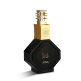 The image displays a perfume bottle from Nabeel Perfumes named "Irth". The bottle is designed with an octagonal black body and a luxurious golden neck, capped with a complex golden spray nozzle featuring intricate details. The front of the bottle has the perfume's name, "Irth", in stylized gold font set within an embossed black label with decorative borders. 
