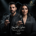 Man and woman dressed in black holding Lattafa Ishq Al Shuyukh Silver perfume bottles.