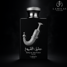 Lattafa Ishq Al Shuyukh Silver perfume bottle in spotlight against dark background.