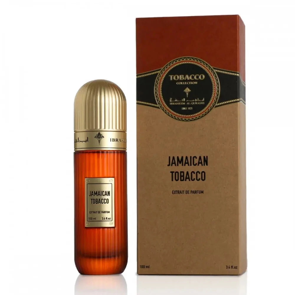 This image displays a tall, cylindrical amber-colored perfume bottle with a golden cap, labeled "Jamaican Tobacco" by Ibraheem Al Qurashi. The label shows "Extrait de Parfum" and the volume "100 ml / 3.4 fl.oz." To the right is the packaging, a rectangular box with a kraft paper texture and brown upper section, including the text "TOBACCO COLLECTION" in a circular emblem and the Ibraheem Al Qurashi logo.