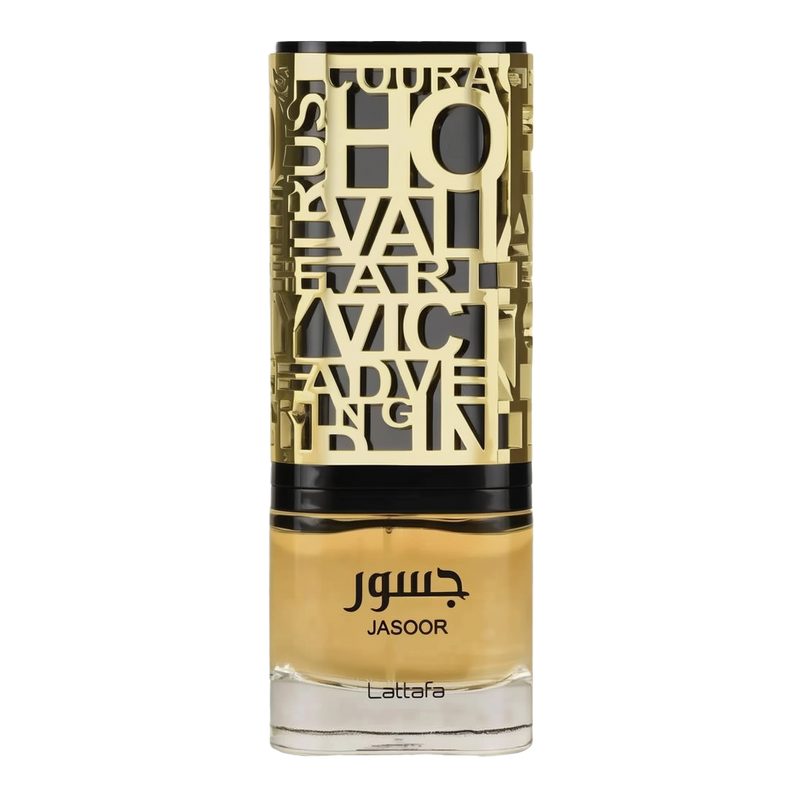 The image shows a bottle of perfume. The bottle has a clear bottom filled with yellow-amber colored liquid, presumably the fragrance. It features a detailed, ornate, gold-colored metallic overlay with cut-out letters and designs, and a black band towards the top, under the cap. The name "JASOOR" is prominently displayed in the middle of the bottle, with the brand "Lattafa" written at the bottom. The overall design suggests a luxurious and perhaps Middle Eastern-inspired aesthetic.