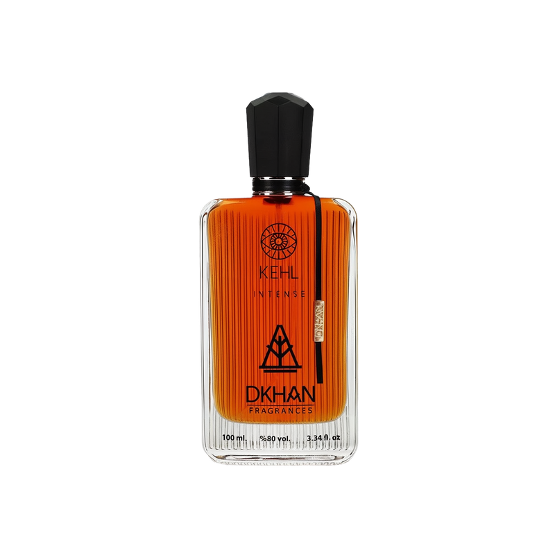 The image shows a rectangular glass perfume bottle with a black cap, filled with an orange-colored liquid. The bottle has several labels: the top one includes a circular logo with the text "KEHL" and a smaller text below it reads "INTENSE". In the center, there's a large stylized emblem with the text "DKHAN FRAGRANCES" beneath it.