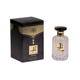 A transparent glass perfume bottle with a clear liquid and a black and gold cap. The front label features "KHALILAB" in black Arabic calligraphy and below it "DEHNEE" in smaller English lettering. The bottle is placed beside its box, which is black with a textured pattern and a gold upper section that includes the same logo and text, "EAU DE PARFUM NATURAL SPRAY 100ml 3.4FL.OZ." The box has decorative elements and a crest-like design at the top.