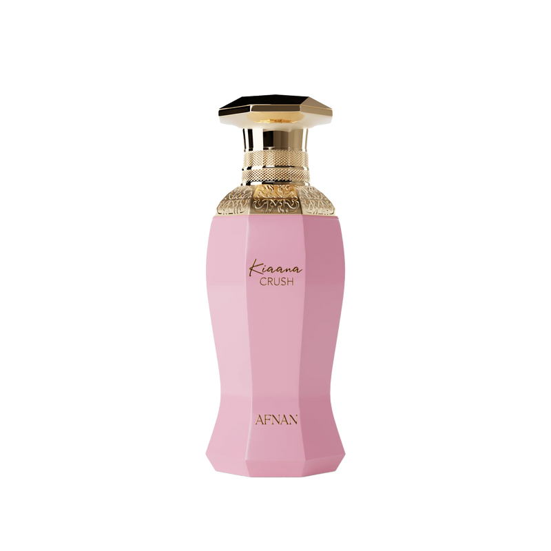 Pink faceted perfume bottle with gold ornate cap and Kiaana Crush Afnan branding on front.