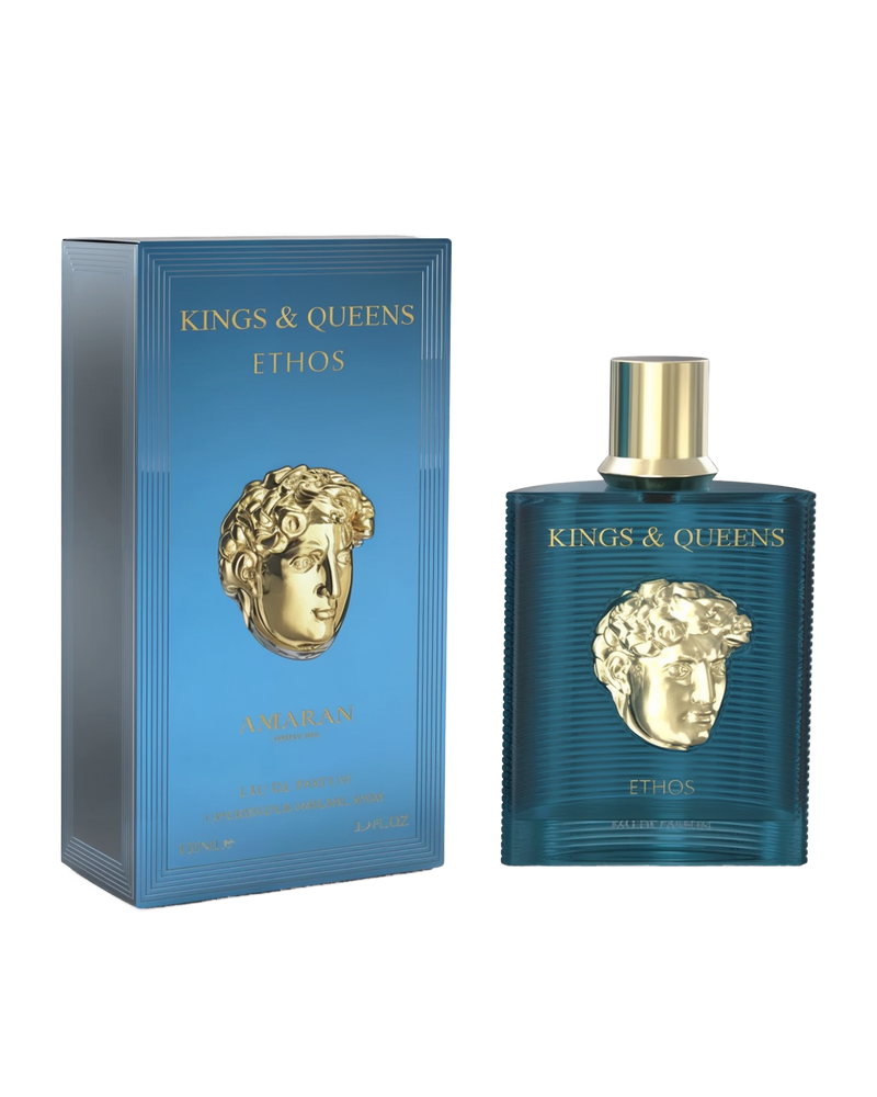 A rectangular teal perfume bottle with a gold cap and a gold classical bust design on the front stands beside a matching teal box. Both feature the text “Kings & Queens Ethos” and the brand name “Amaran” in gold lettering.