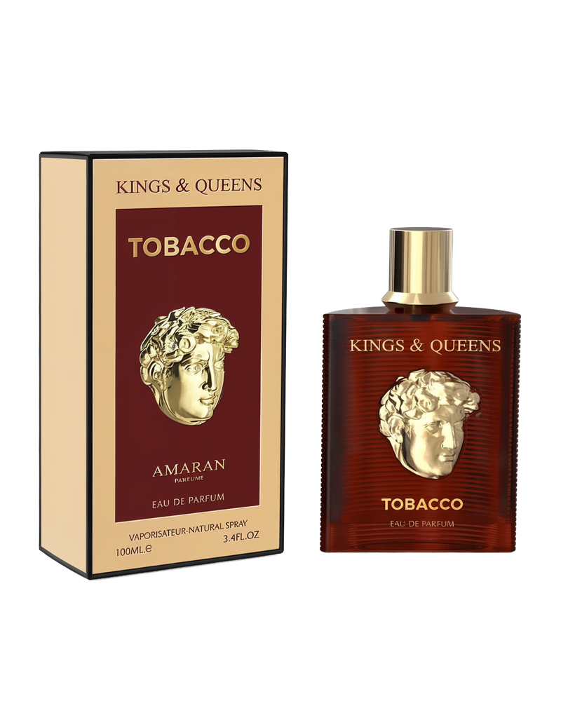 A rectangular warm brown perfume bottle with a gold classical bust on the front and a gold cap stands next to a black-edged maroon box. Both feature the text “Kings & Queens Tobacco” and the brand name “Amaran Parfums” in gold lettering.