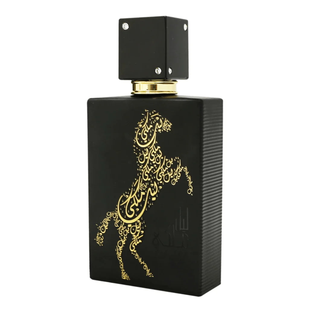 A sleek black bottle of Lail Maleki Eau de Parfum by Ard Al Zaafaran, featuring an elegant gold design of a rearing horse made up of intricate Arabic calligraphy. The bottle has a textured finish and a square black cap adorned with small silver accents. The luxurious and artistic design of the bottle highlights the sophistication and exclusivity of the fragrance.