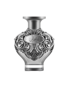 Ornate, sculptural perfume bottle from Le?Falcone’s Sultan Niche Collection in a metallic silver-gray finish, its bulbous body adorned with intricate filigree scrollwork and a polished oval plaque bearing Arabic calligraphy “?????” above the English word “SULTAN.