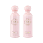 The image features two light pink perfume bottles from the "Legend of the Sky for Her" collection by Gissah, named "Sora" and "Ellora." The bottles have a cylindrical shape with detailed ornamental designs embossed on the silver caps and the central gold medallions. The names "Sora" and "Ellora" are inscribed on gold plaques at the base of each bottle. 