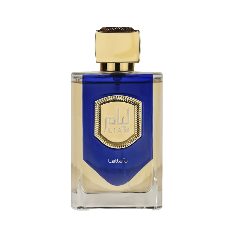 The image features a bottle of Liam Blue Shine perfume by Lattafa. The bottle has a clear, rectangular glass base with a blue color gradient at the top half. It features a prominent gold label with a textured border and the name "Liam" in stylized font in the center. Below the label, the word "Lattafa" is printed in small, simple white letters. The cap of the bottle is a smooth, metallic gold color with a faceted design, giving it a luxurious and elegant appearance.