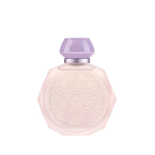 A pastel pink octagonal perfume bottle with intricate embossed designs on the front. The bottle features a matching pastel purple cap and a silver collar, adding a touch of elegance and sophistication. The soft colors and detailed patterns give the bottle a delicate and luxurious appearance, perfect for a high-end fragrance.