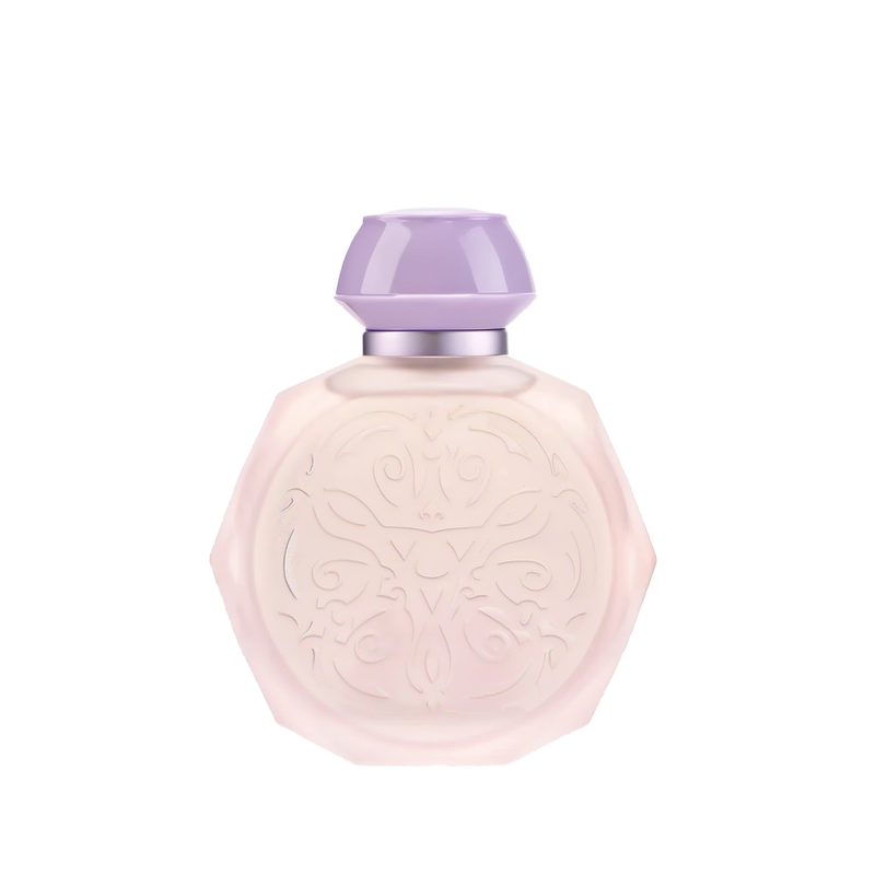 A pastel pink octagonal perfume bottle with intricate embossed designs on the front. The bottle features a matching pastel purple cap and a silver collar, adding a touch of elegance and sophistication. The soft colors and detailed patterns give the bottle a delicate and luxurious appearance, perfect for a high-end fragrance.