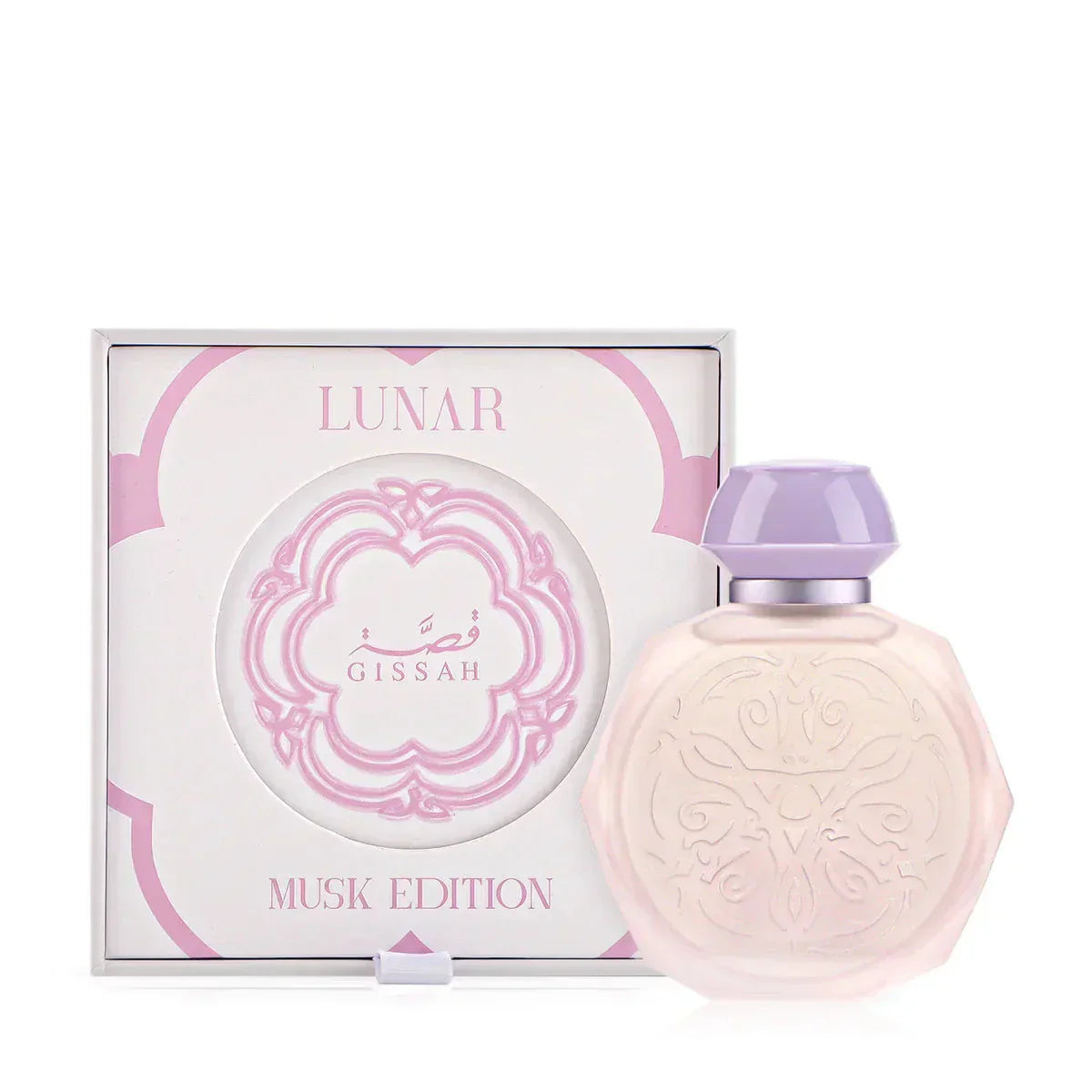 A pastel pink octagonal perfume bottle with intricate embossed designs on the front, accompanied by a matching pastel purple cap and a silver collar. The bottle is displayed next to its elegant white and pink box, labeled "Lunar Musk Edition" with the Gissah brand name prominently featured. The box design includes ornate patterns and accents that complement the delicate and luxurious appearance of the bottle.