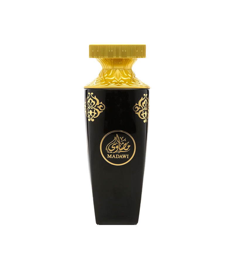 A luxurious bottle of Madawi perfume by Arabian Oud, featuring a sleek black body adorned with ornate gold patterns and Arabic calligraphy. The bottle has a wide, gold-embossed cap with intricate detailing and the brand name 'MADAWI' written in gold within a circular emblem on the front.