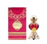 An elegant red perfume bottle with a gold ornate cap and base, featuring a tag that reads 'Malika' in gold and Arabic script, showcasing its luxurious and inviting design.