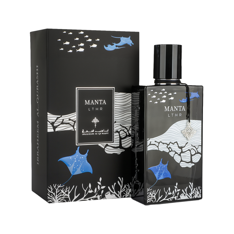 A stylish bottle of Manta LTHR Eau De Parfum by Ibraheem Al-Qurashi, presented alongside its matching box. The black rectangular bottle features underwater-themed artwork with blue manta rays, white fish, coral, and wave patterns. The bottle has a glossy black cap and a silver ornamental charm hanging from its neck. The outer packaging mirrors the aquatic design, with the Manta LTHR name prominently displayed in white on a black label.