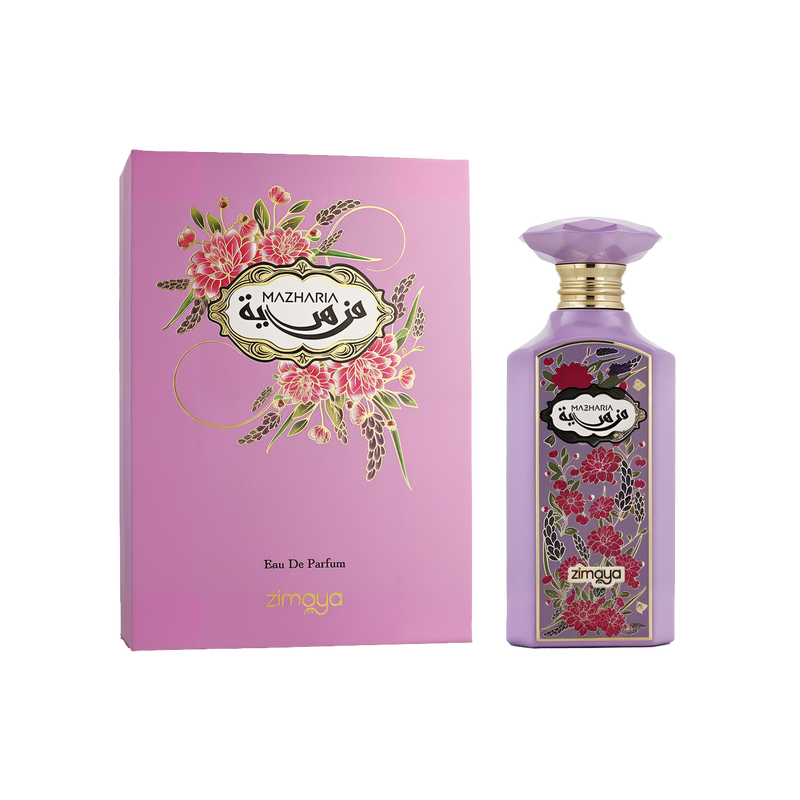 A bottle and box of Mazharia Eau De Parfum by Zimaya. The packaging and bottle are both in a soft lavender color with intricate floral designs in shades of red, pink, and green. The label reads "MAZHARIA" in both English and Arabic within an ornate black and gold frame. The perfume bottle has a faceted cap and gold neck, and both the box and bottle are elegantly adorned with floral artwork.