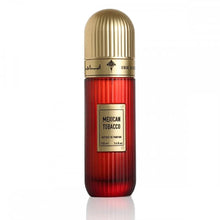 This image shows a tall, cylindrical perfume bottle with a gold cap, labeled "Mexican Tobacco" by Ibraheem Al Qurashi. The bottle has a red gradient color that gets deeper towards the bottom and displays the volume as "100 ml / 3.4 fl.oz." The background is white, which accentuates the vivid red color and the golden accents of the bottle.