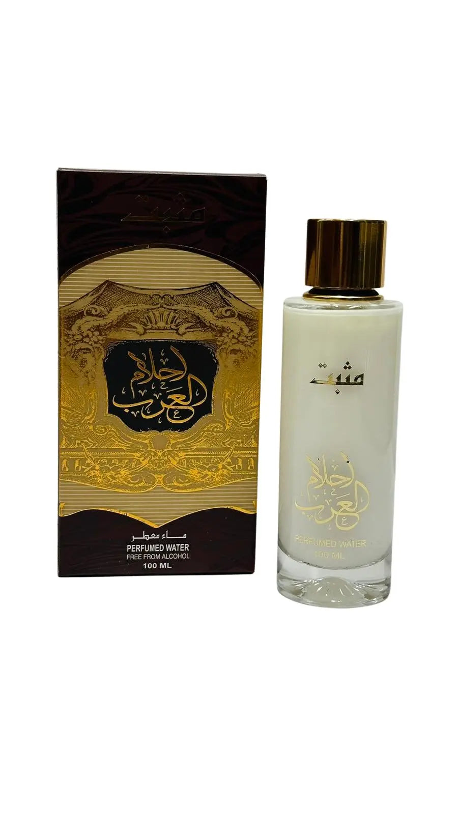 A product image featuring a bottle of perfumed water next to its packaging. The bottle is clear with a frosted finish and gold lettering, alongside a shiny gold cap. It holds 100 ml of liquid. The box has a luxurious design with gold and black colors, Arabic calligraphy, and the phrase "PERFUMED WATER FREE FROM ALCOHOL" in English at the bottom.