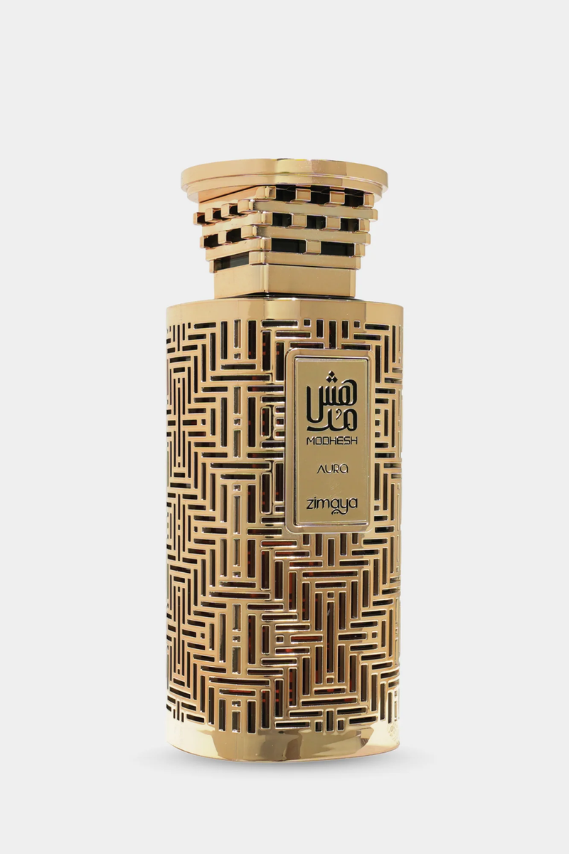 Zimaya Modhesh Aura perfume in intricate gold patterned bottle with decorative square cap.