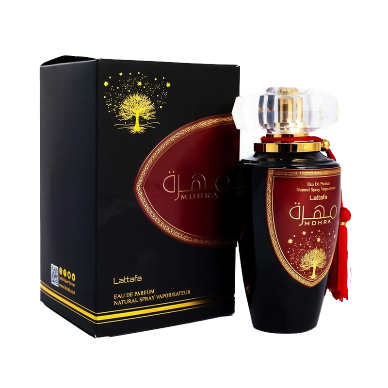 A luxurious black and gold box of "Mohra" Eau de Parfum by Lattafa, featuring an ornate golden tree design and elegant Arabic script. The box is placed next to a matching perfume bottle with a black base, adorned with a large maroon and gold label. The bo