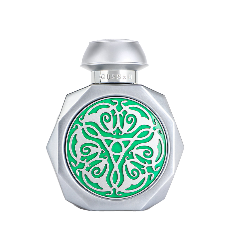Silver perfume bottle with green decorative emblem.