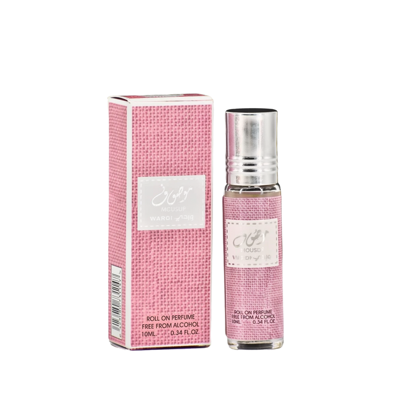 The image shows a product named "Mousuf Wardi," which is a roll-on perfume oil by Ard Al Zaafaran. The product is contained in a small 10 ml (0.34 fl. oz.) glass bottle with a metallic cap. The bottle and its accompanying box are both adorned with a pink 
