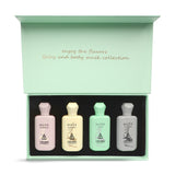 This image displays the Baby and Body Musk Collection from DKHAN Fragrances. The collection is presented in a mint green box with the lid open, revealing four bottles of musk perfumes. Each bottle has a unique pastel color—pale pink for "MUSK POWDER," soft yellow for "MUSK MANGO," mint green for "MUSK LOLO," and light grey for "MUSK CHOCO." The DKHAN Fragrances logo is on each bottle, adding a consistent and luxurious branding element.