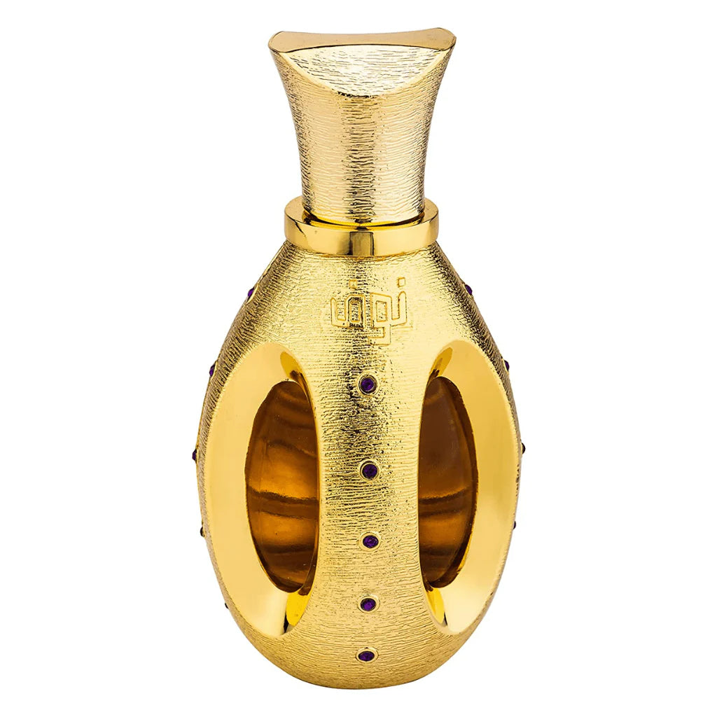 The image shows a striking perfume bottle with a textured gold finish. The design is unique, resembling two interlocking rings with purple gemstone accents. The top of the bottle tapers into a narrow neck with a wider, textured gold cap. On the front, the bottle has Arabic script embossed, suggesting it may be the name of the fragrance or the brand. The overall appearance is luxurious and exotic, likely inspired by Middle Eastern or Arabian design aesthetics.