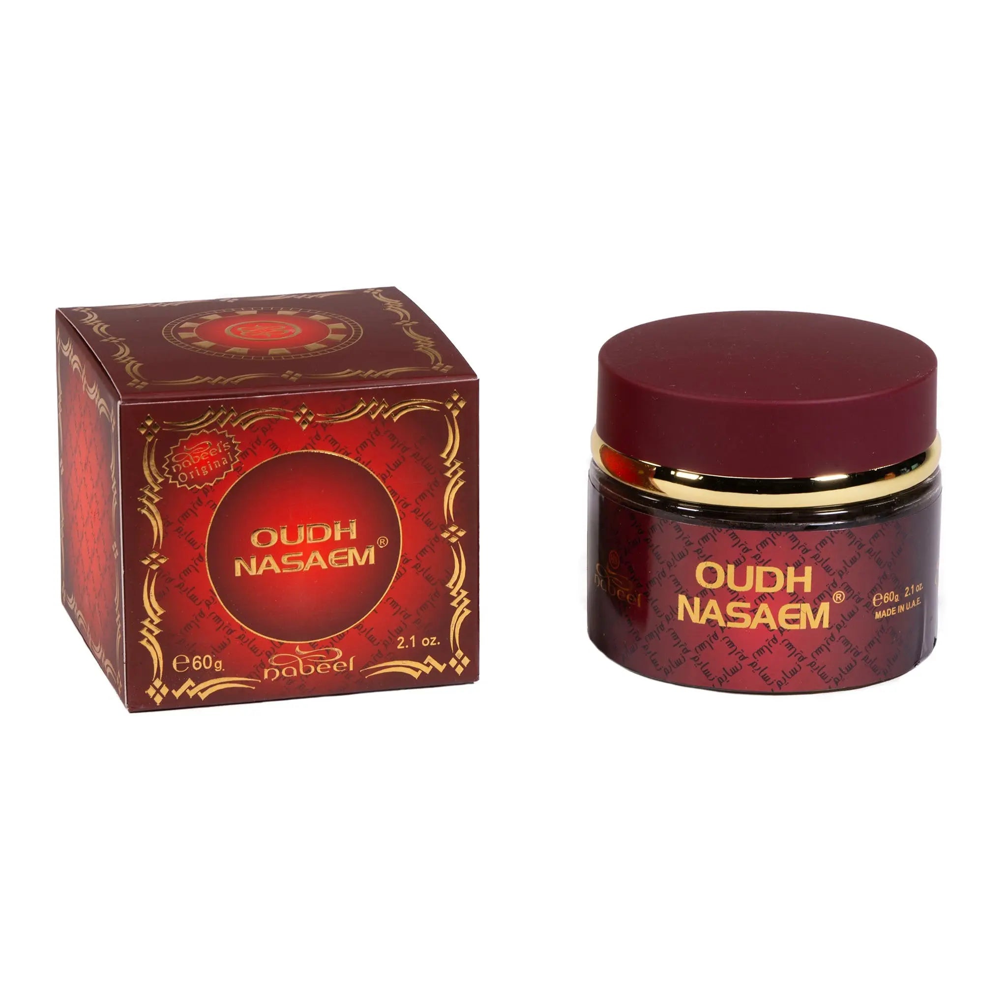 The image displays a fragrance product with its packaging on a white background. To the left is a cube-shaped box with a rich red background featuring ornate golden Arabic calligraphy and patterns. The front of the box has a circular label with the words "OUDH NASEEM" in large golden letters against a red backdrop, and below in smaller text is the brand "nabeel." This item appears to be a type of scented Oudh, commonly used in Middle Eastern regions as a perfume or for scenting rooms.