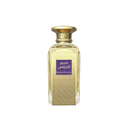 The image is of a perfume bottle with a rich golden color and textured design. The bottle has a rectangular shape with a curved top and a broad, flat base. The cap is a smooth, polished gold matching the bottle's texture. On the front, there is a purple label with Arabic script, which translates to "Naseej Al Khuzama," indicating the name of the fragrance. The text below the Arabic script, in smaller font, is the English transliteration of the name.