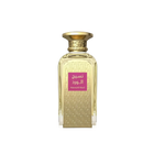 The image shows a rectangular glass perfume bottle with a gold-colored cap. The body of the bottle is adorned with a dense pattern of embossed or etched geometric lines, giving it a textured appearance. A prominent label with Arabic script is placed in the center of the bottle, featuring a magenta background which stands out against the golden tones of the bottle's design. The label text "Naseej Al Ward" is also visible in Latin script, suggesting the name of the perfume or the brand. 